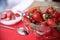 Ripe red strawberry in a transparent plate