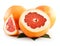 Ripe Sliced Grapefruit with Leaves Isolated