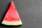 ripe slices of watermelon on a black background with a place for writing close-up. top view