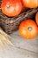 Ripe small pumpkins in basket