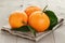 Ripe spanish oranges on wood table