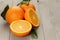 Ripe spanish oranges on wood table