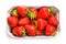 Ripe strawberries in a carton box