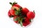 Ripe strawberries in a plastic package on a white background. Delicious fresh berries in a container for sale to