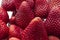 Ripe strawberry fruit closeup background. Macro image
