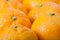 Ripe tangerines closeup background