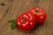 Ripe tomato over wooden background