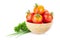 Ripe tomatoes in a bowl, parsley and onion