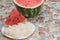 Ripe watermelon slices on stones