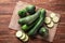 Ripe zucchinis on wooden table