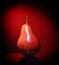 Ripen pear isolated on red background