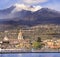 Riposto e  il vulcano Etna sullo sfondo vista dal porto marittimo della cittadina