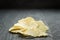 Rippled organic chips on wooden table