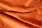 Rippled reddish orange artificial suede fabric
