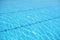 Rippled surface of Swimming pool blue water sun reflecting sleek background