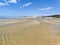 Rippled water crosses the mouth of the Bushmans River at low tide.