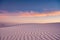 Rippling Sand Dune Stands Untouched At Sunset