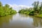 Rippling water surface in a wide Dutch creek