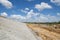 Riprap slope protection in a road construction project. Road slope protection from landslides, and floods.