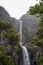 Risco waterfall on madeira island, portugal, in the middle of the tropical forest