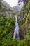 Risco waterfall on madeira island, portugal, in the middle of the tropical forest