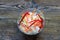 Rise noodles in black bowl on wooden background