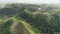 Rise-up aerial green grass hills top and ranges view at Mayon town, Philippines, Asia