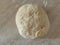 Risen or Proved Yeast Dough top view. Dough and Flour.