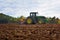 Rish, Bulgaria - Octomber 26th, 2015 Ploughing a field with John Deere 6930 tractor. John Deere 8100