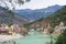 Rishikesh, holy town and travel destination in India. The Ganges River flowing between mountain from the Himalayas
