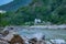 Rishikesh in India very beautiful scenery with boat in the river ganges in Rishikesh lake in the mountains of Himalayas exotic tou