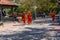 Rishikesh,Uttarakhand - 29.03.2023. People in traditional orange siddha clothes walk the streets of Rishikesh, Holy