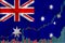 Rising against the backdrop of the Australia flag and stock price fluctuations. Rising stock prices of companies