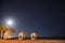 Rising moon over pacific ocean beach