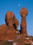 Rising moon and redrock formations in Arches National Park, Utah