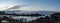 The rising sun is just behind the clouds over Playa Chica Beach in Puerto del Carmen, Lanzarote, Spain