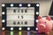 Risk is gain motivational phrase on marquee lightbox - self development concept