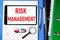 Risk management-lettering on a tablet PC. Analysis of the probability and consequences of adverse events, financial losses of