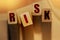 Risk Word On Wooden Blocks. Se,lective focus. Risk management business concept. Healthcare concept