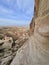 A risky path around the high limestone rock in Cappadocia, Turkey