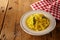 Risotto alla milanese in soup bowl