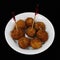 Risotto arancini balls, deep fried breaded rice balls, italian food specialty