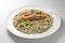 Risotto dish with prawns and seafood and parsley