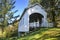 Ritner Creek Bridgerests atop a shady, grass-covered knoll.