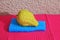 Ritual Orange etrog on a crimson background