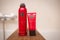 RITUALS body care containers set. body lotion, hand lotion Ayurveda red edition in bathroom