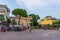 RIVA DEL GARDA, ITALY, JULY 22, 2019: People are strolling at Piazza Cesare Battisti in Riva del Garda in Italy