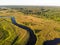 River, aerial view. Winding river and forest. Summer landscape, top view. A valley with a winding riverbed