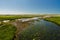 River afon Ffraw and sand dunes Aberffraw, Anglesey.