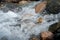 River amongst stone in valley mountains